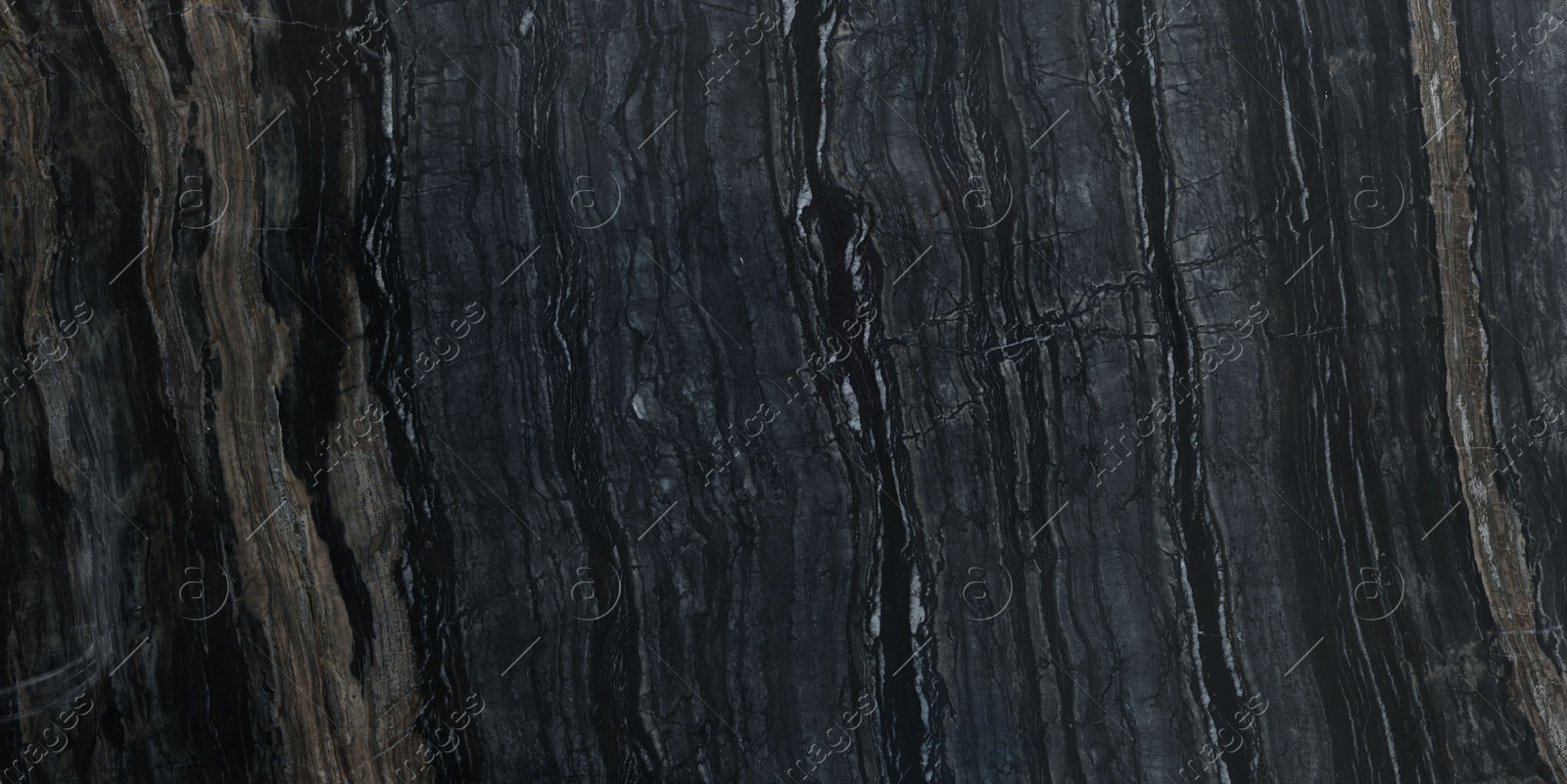 Photo of Texture of dark marble surface as background, top view