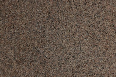 Photo of Texture of stone surface as background, top view