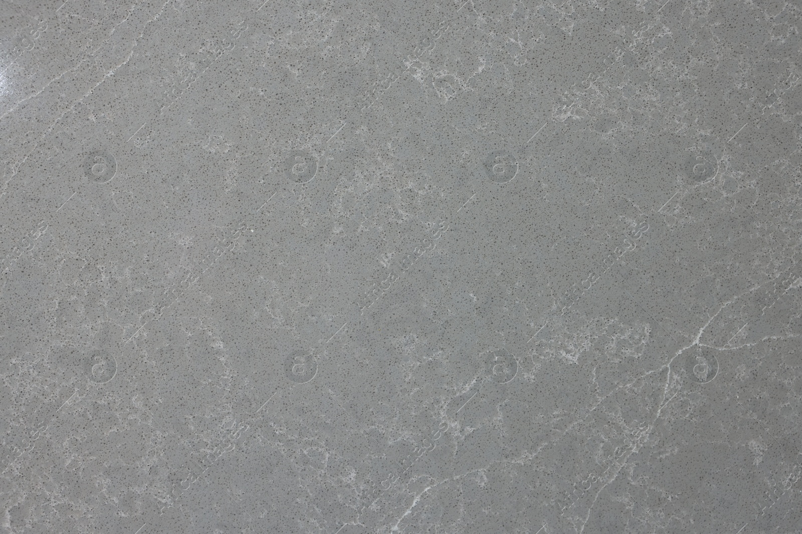 Photo of Texture of grey marble surface as background, top view