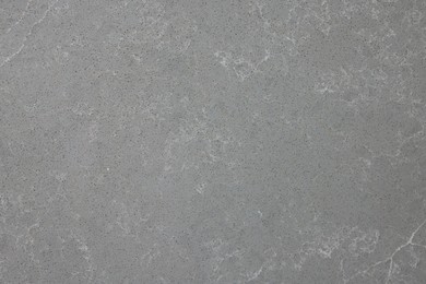Photo of Texture of grey marble surface as background, top view