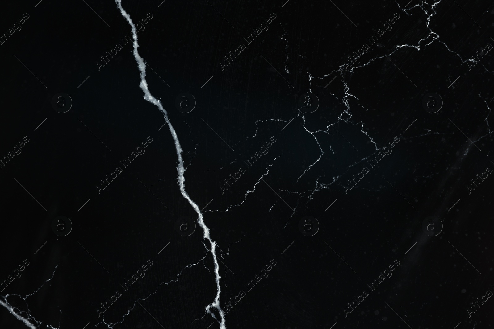 Photo of Texture of black marble surface as background, top view