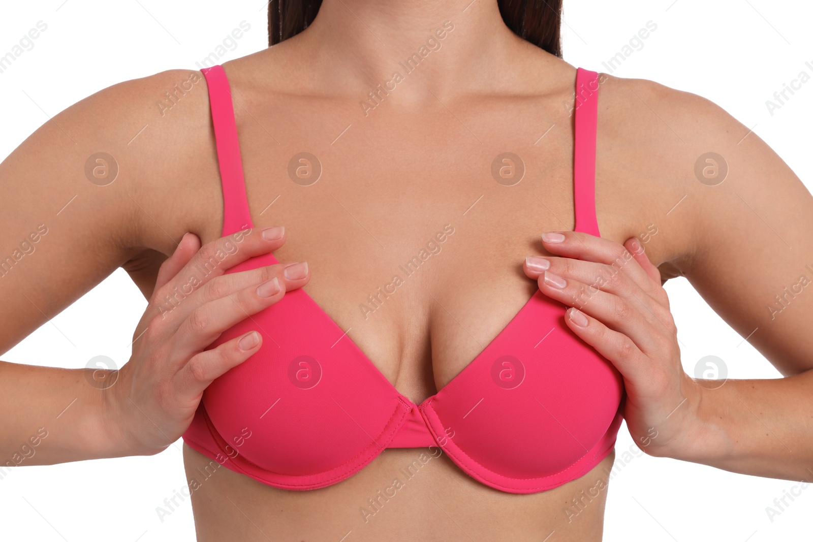 Woman wearing beautiful pink bra on white background, closeup Photo of Woman wearing beautiful pink bra on white background, closeup