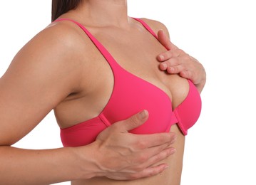 Photo of Woman wearing beautiful pink bra on white background, closeup