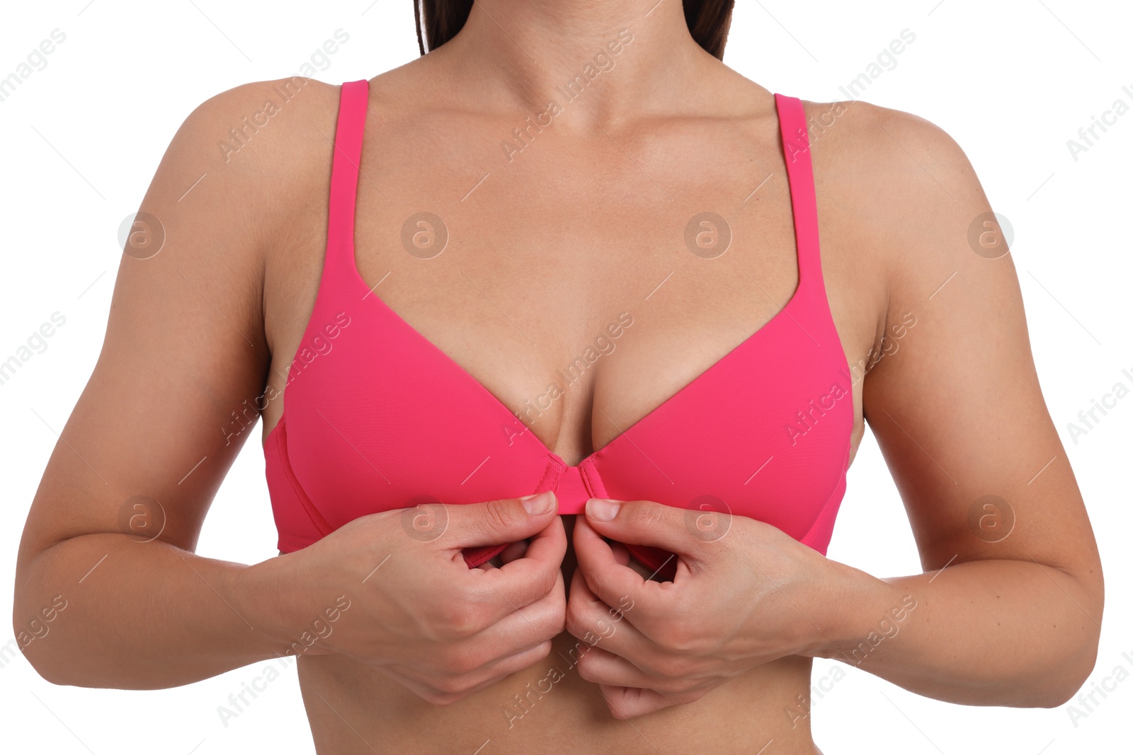 Woman wearing beautiful pink bra on white background, closeup Photo of Woman wearing beautiful pink bra on white background, closeup