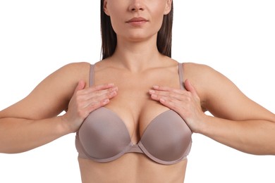 Photo of Woman wearing beautiful beige bra on white background, closeup