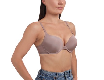 Photo of Woman wearing beautiful beige bra on white background, closeup