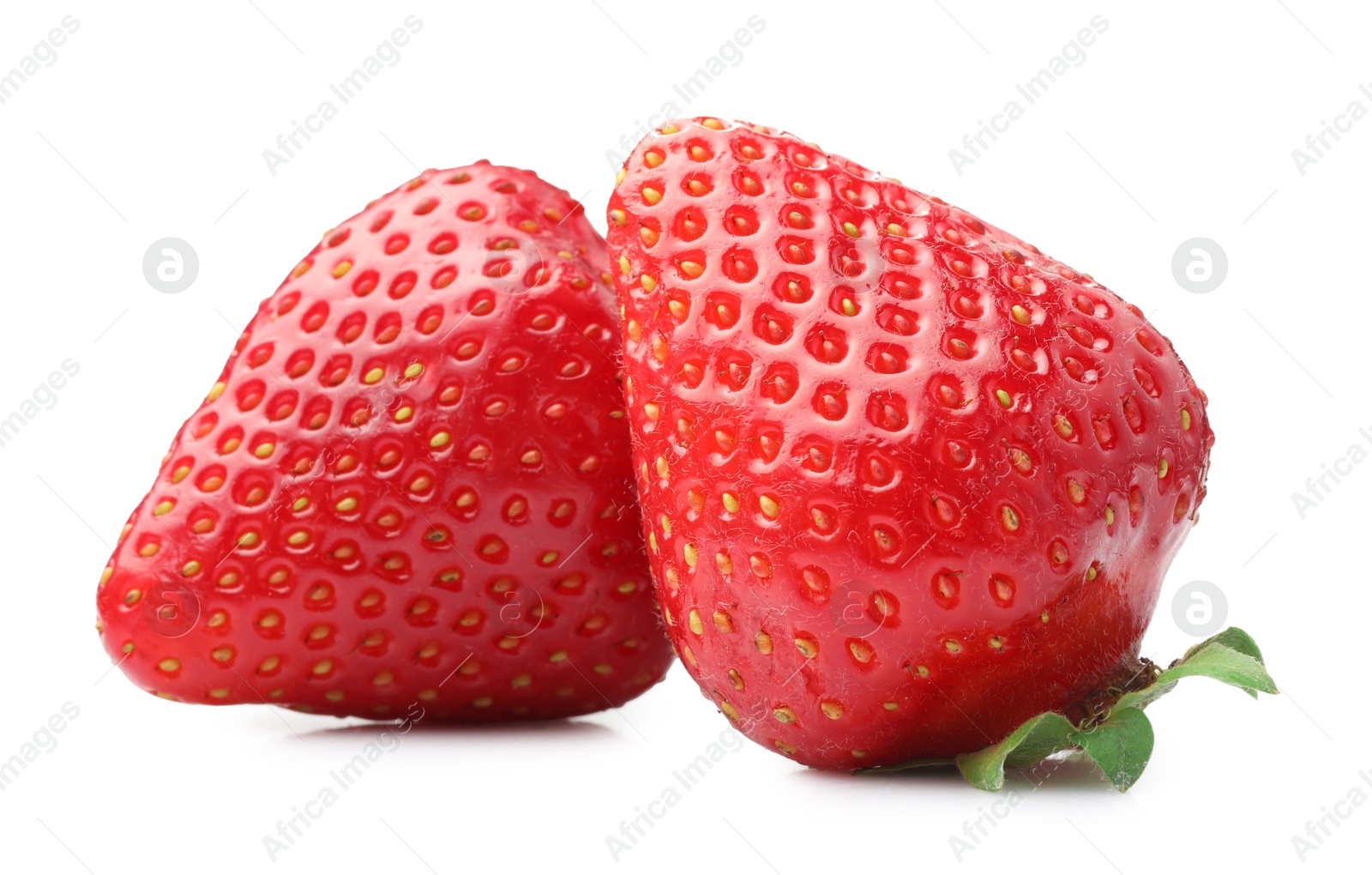 Two fresh ripe strawberries isolated on white Photo of Two fresh ripe strawberries isolated on white