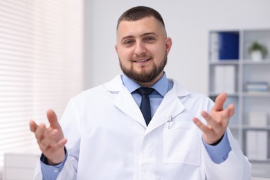 Photo of Portrait of doctor in uniform in clinic