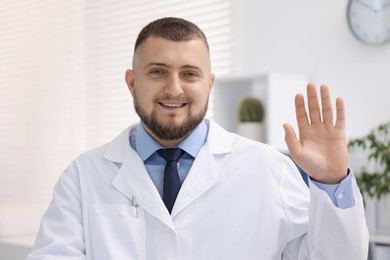 Photo of Portrait of doctor in uniform in clinic