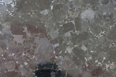 Photo of Texture of stone surface as background, top view