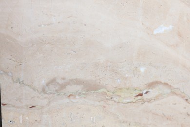 Photo of Texture of marble surface as background, top view