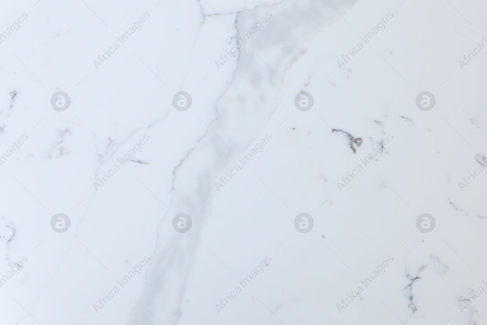 Photo of Texture of white marble surface as background, top view