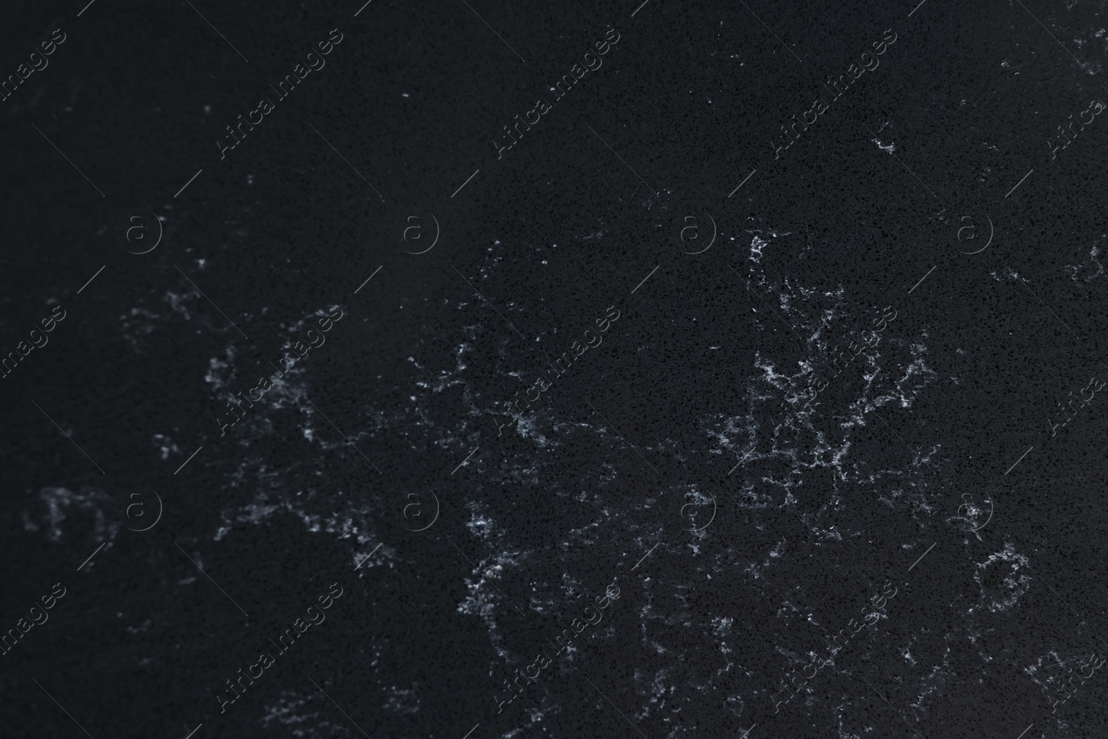 Photo of Texture of black marble surface as background, top view