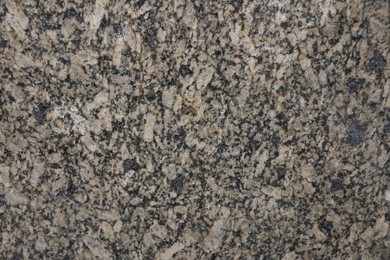 Photo of Texture of stone surface as background, top view