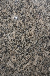 Photo of Texture of stone surface as background, top view