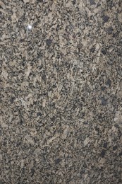 Photo of Texture of stone surface as background, top view