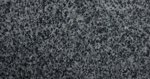 Photo of Texture of stone surface as background, top view