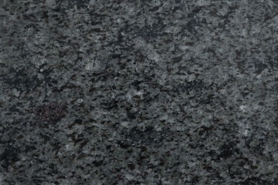 Photo of Texture of stone surface as background, top view