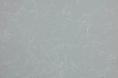 Photo of Texture of grey marble surface as background, top view