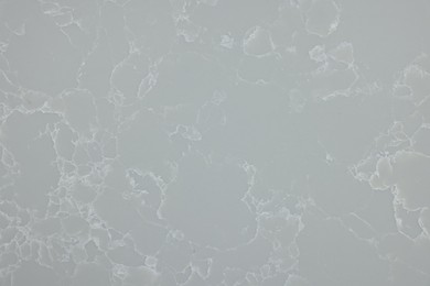 Photo of Texture of grey marble surface as background, top view