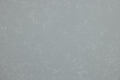 Photo of Texture of grey marble surface as background, top view