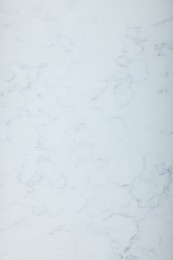 Photo of Texture of white marble surface as background, top view