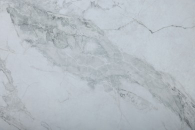 Photo of Texture of white marble surface as background, top view