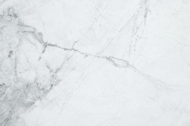 Photo of Texture of white marble surface as background, top view