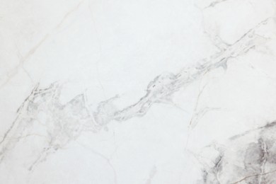 Photo of Texture of white marble surface as background, top view