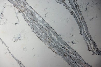 Photo of Texture of marble surface as background, top view