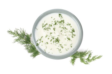 Photo of Delicious yogurt in bowl and dill isolated on white, top view