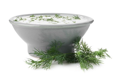 Photo of Delicious yogurt in bowl and dill isolated on white