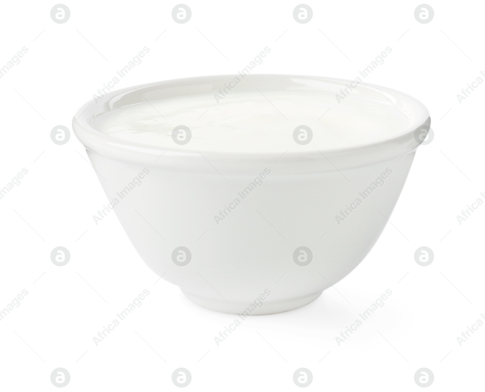 Photo of Delicious yogurt in bowl isolated on white
