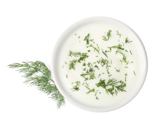 Photo of Delicious yogurt in bowl and dill isolated on white, top view