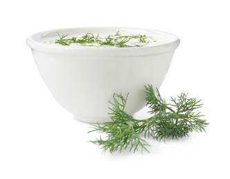 Photo of Delicious yogurt in bowl and dill isolated on white