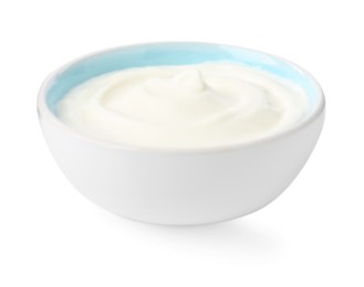 Photo of Delicious yogurt in bowl isolated on white