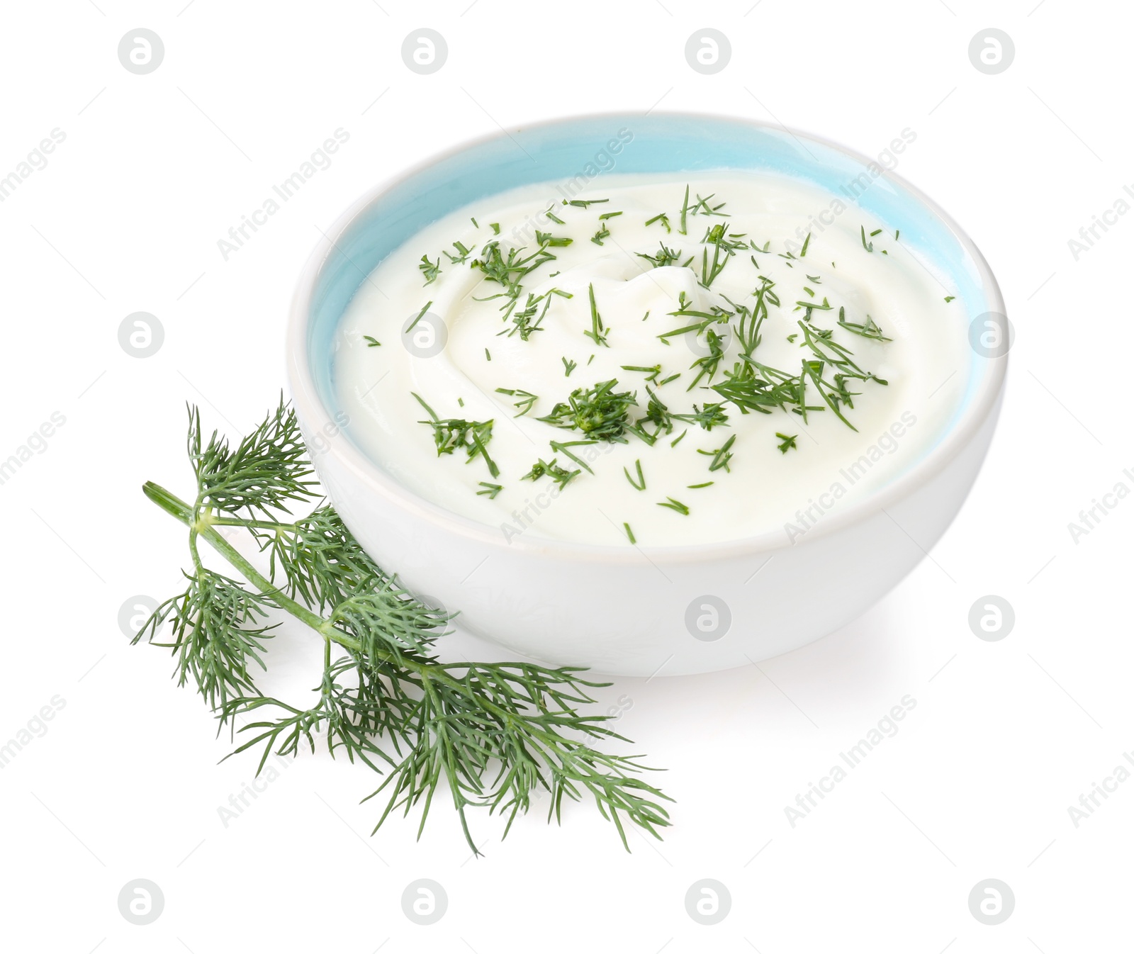Photo of Delicious yogurt in bowl and dill isolated on white