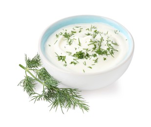 Photo of Delicious yogurt in bowl and dill isolated on white