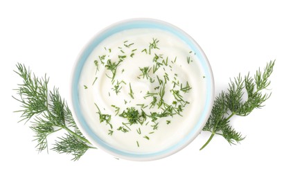 Photo of Delicious yogurt in bowl and dill isolated on white, top view