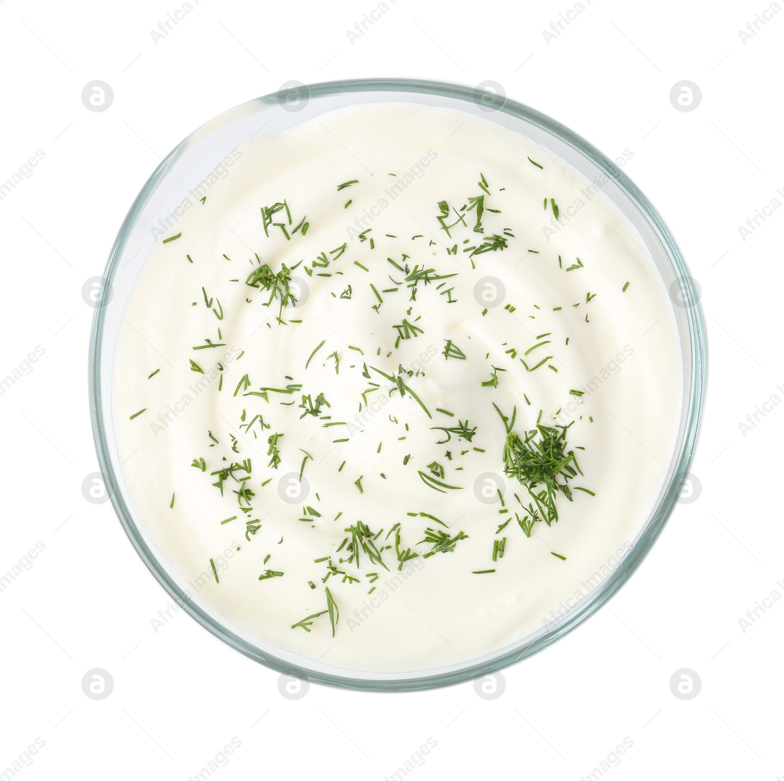 Photo of Delicious yogurt with dill in bowl isolated on white, top view