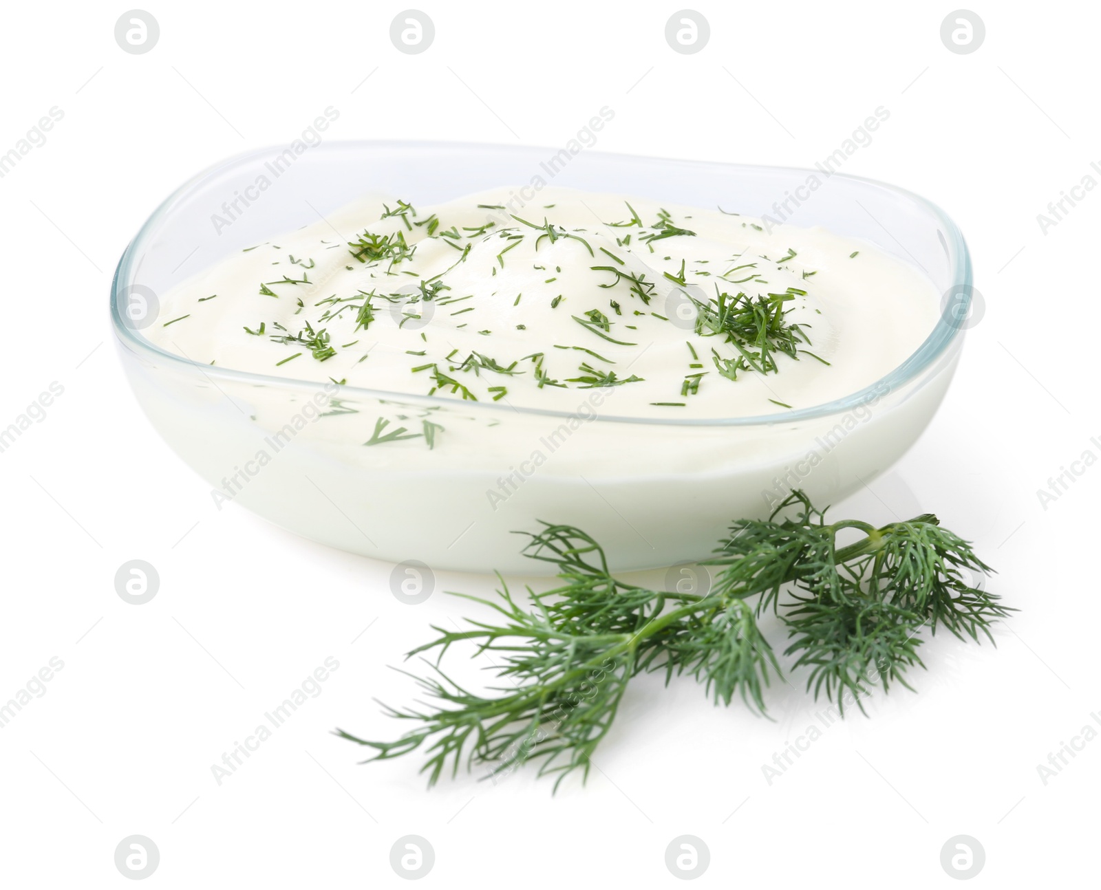 Photo of Delicious yogurt in bowl and dill isolated on white