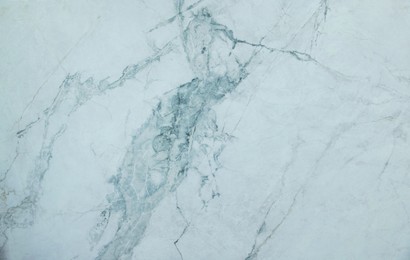Photo of Texture of marble surface as background, top view