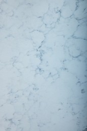 Photo of Texture of white marble surface as background, top view