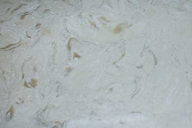 Photo of Texture of stone surface as background, top view