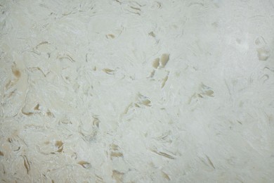 Photo of Texture of stone surface as background, top view