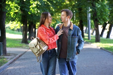 Photo of Lovely couple spending time together in park