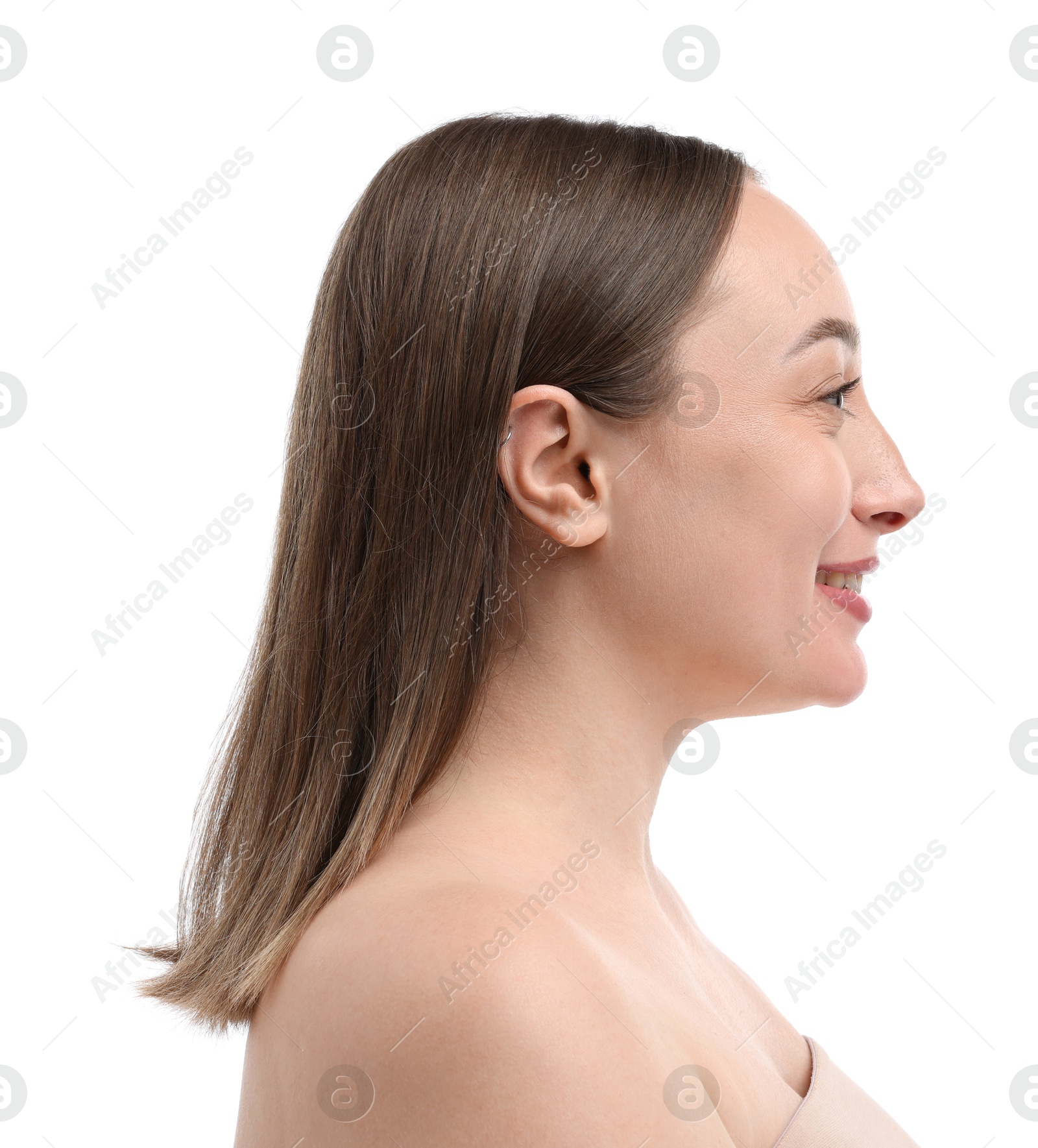 Smiling woman on white background. Cosmetology and skincare Photo of Smiling woman on white background. Cosmetology and skincare