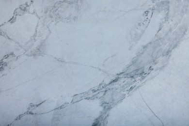 Photo of Texture of white marble surface as background, top view