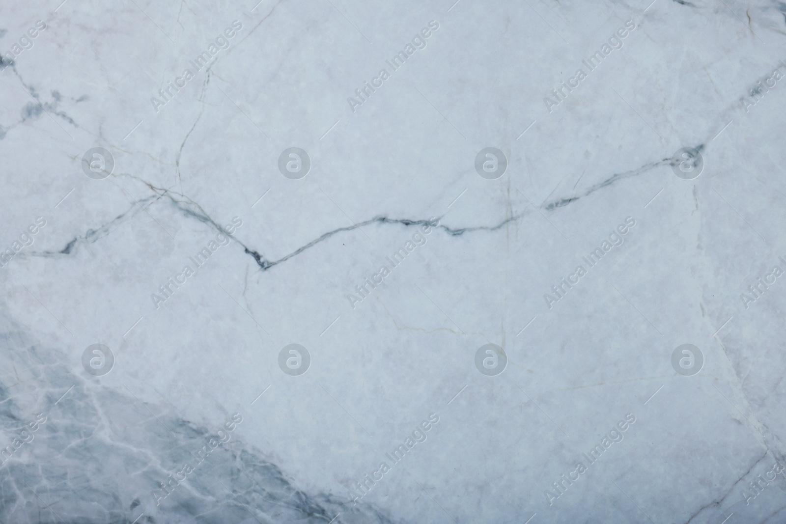 Photo of Texture of white marble surface as background, top view