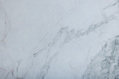 Photo of Texture of white marble surface as background, top view